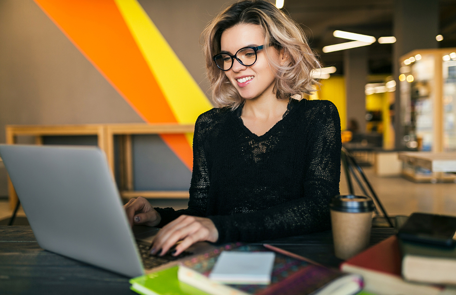 Female student working at a desk