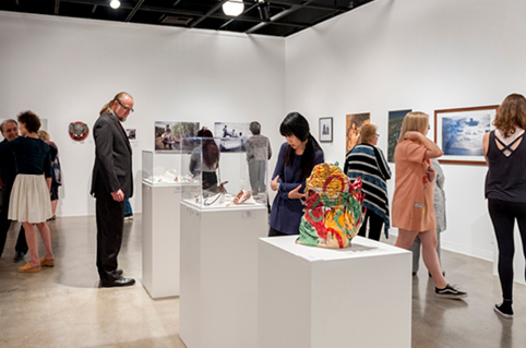 People looking at art in the art gallery