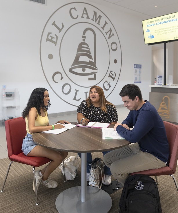 Students sitting in the Student Services Building