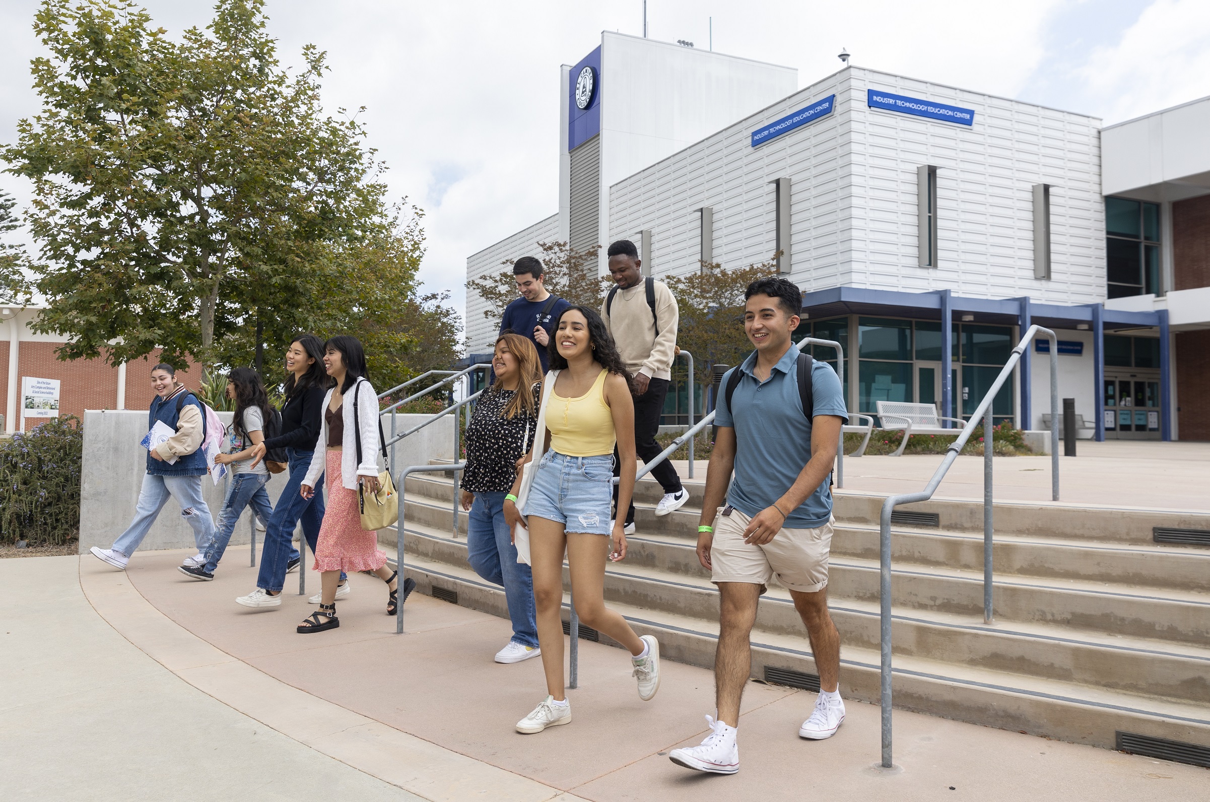 Students walking by the ITEC building.