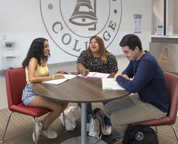 Students sitting in the Student Services Building