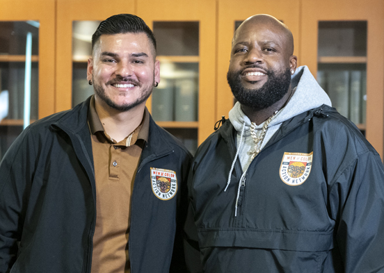 ECC counselor Diego Rodriguez and student Reginald Jackson of the Men of Color Action Network pose in the Archive Room at El Camino College.