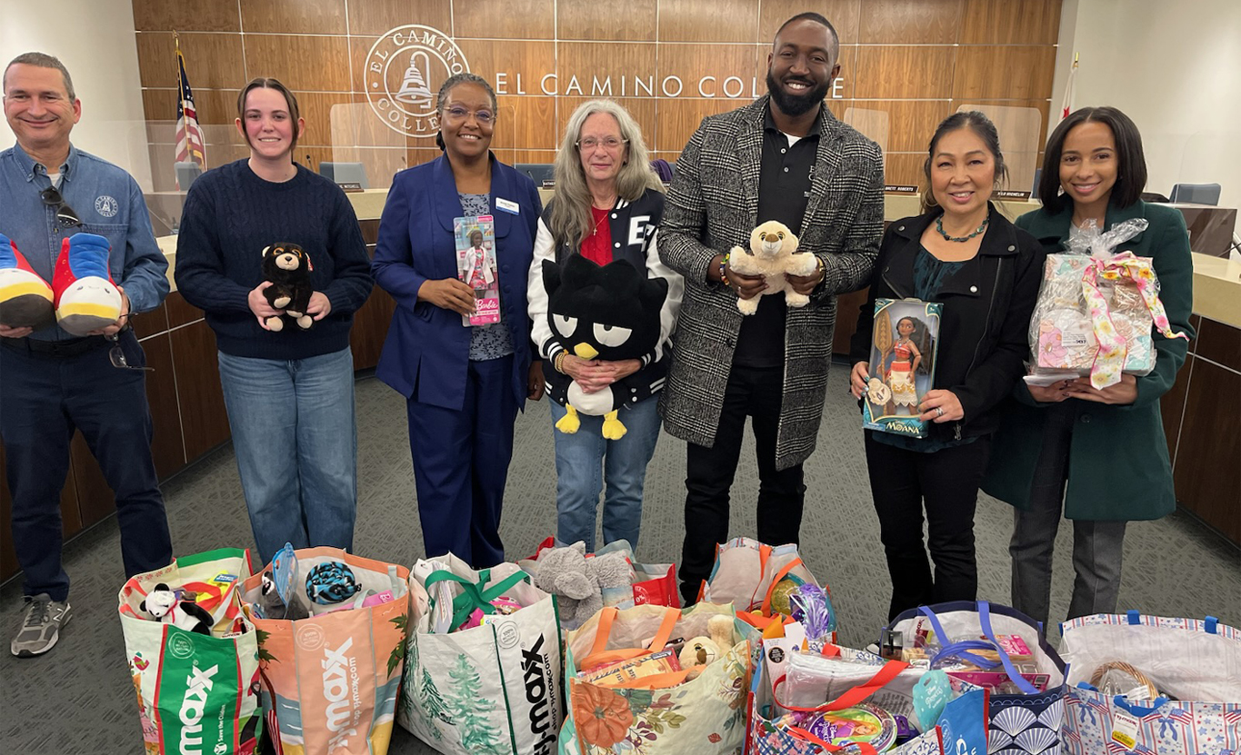 El Camino Community College District’s Board of Trustees join in the season for giving with a large donation of toys. (left to right) Trustee Nilo Michelin, Student Trustee Charlie Mitchell, President Dr. Brenda Thames, Trustee Katherine Maschler, Trustee Brett C.S. Roberts, Trustee Tricia Murakawa, and Program Director Kristen Johnson.
